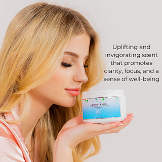 woman using L'or de la Mer Organic Anti Cellulite Body Blaster Scrub