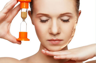 image of a woman with closed eyes and sand clock