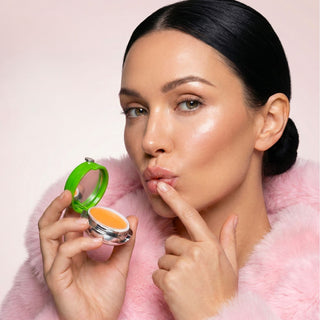 pretty woman is using kissabella mask lip balm