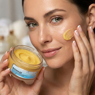 image of woman using Biomaze Gentle cleanser